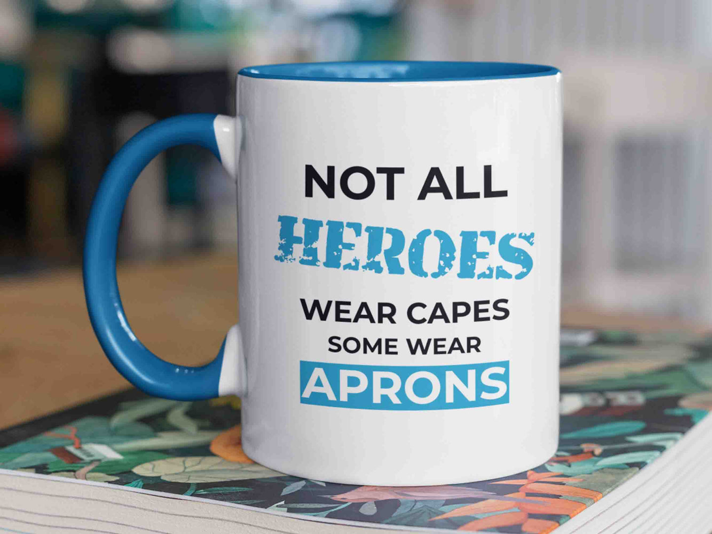 "Not all heroes wear capes, some wear aprons" Masonic mug. This high-quality 11oz ceramic mug features a bold font design with the phrase "Not all heroes wear capes, some wear aprons" paying homage to the principles and values of the Freemason brotherhood. A great gift for any Masonic enthusiast or for yourself, this mug is perfect for sipping your morning coffee or tea while reflecting on the important role of Freemasons in society