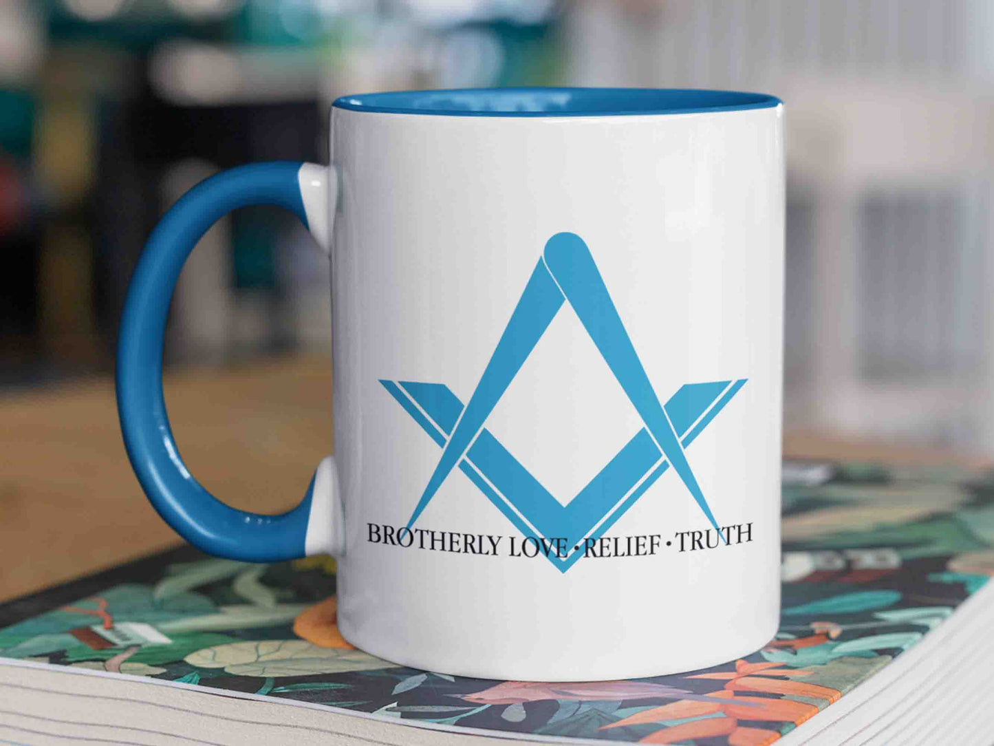 The "Brotherly Love, Relief and Truth" Masonic mug is a must-have for any Freemason or Masonic enthusiast. This 11 oz ceramic mug features a blue square and compass symbol and the text "Brotherly Love, Relief and Truth" written in black in a traditional Masonic font style. Perfect for enjoying your morning coffee or tea while contemplating the principles of brotherhood.