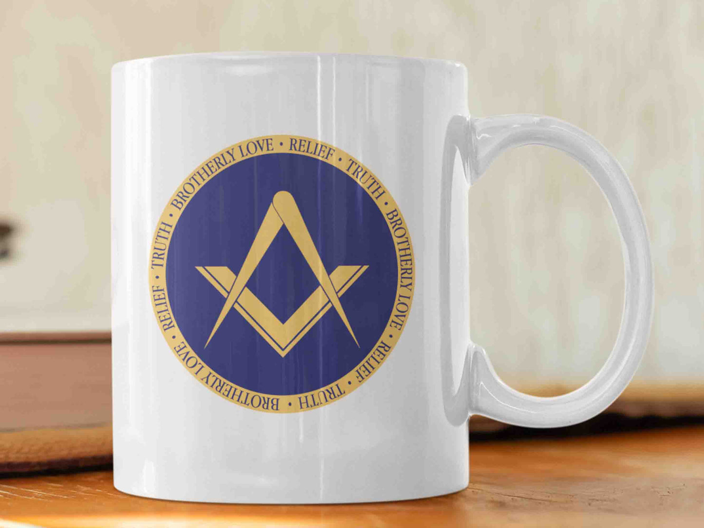 Show your support for the Freemason brotherhood and elevate your morning routine with the "Brotherly Love, Relief and Truth" Masonic mug. This high-quality 11oz ceramic mug features a stunning design, with a golden bronze square and compass symbol in a deep dark Masonic blue circle and the text "Brotherly Love, Relief and Truth" repeated in the golden bronze outer circle. A great gift for any Masonic enthusiast or for yourself, with timeless message of Brotherly Love, Relief and Truth.